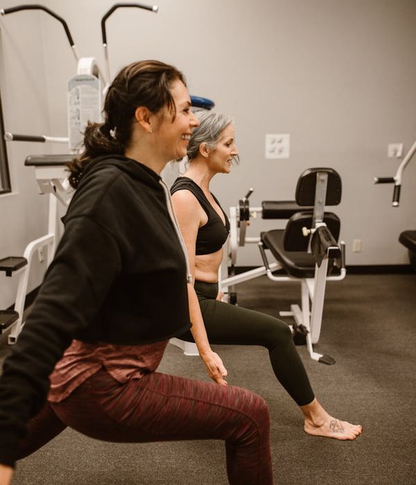 Woman in a dynamic cardio pose, feeling energetic and full of life.